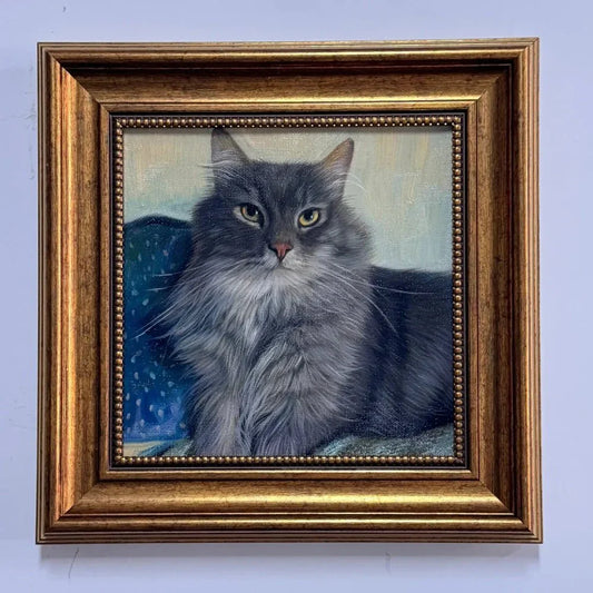 Custom acrylic cat portrait displayed on a wall, inspired by a beautifully photographed black cat using natural window lighting techniques