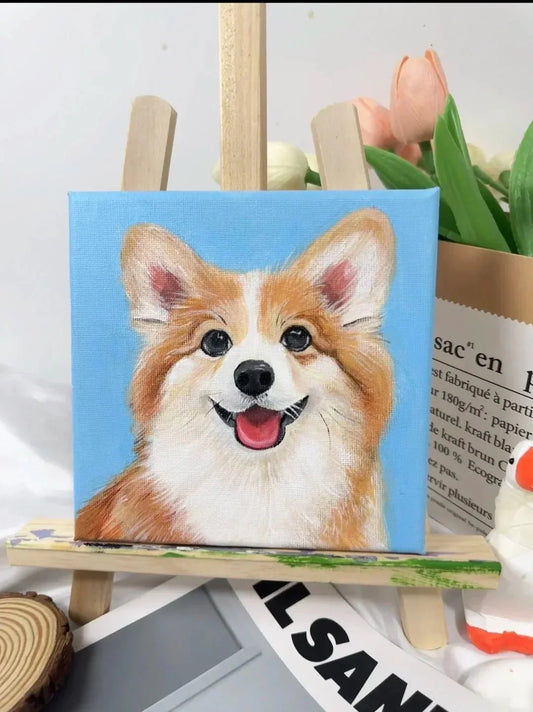 Custom corgi portrait on an easel in an art studio, commissioned as a Gotcha Day gift to celebrate a rescue dog's adoption anniversary at Bolapawzi